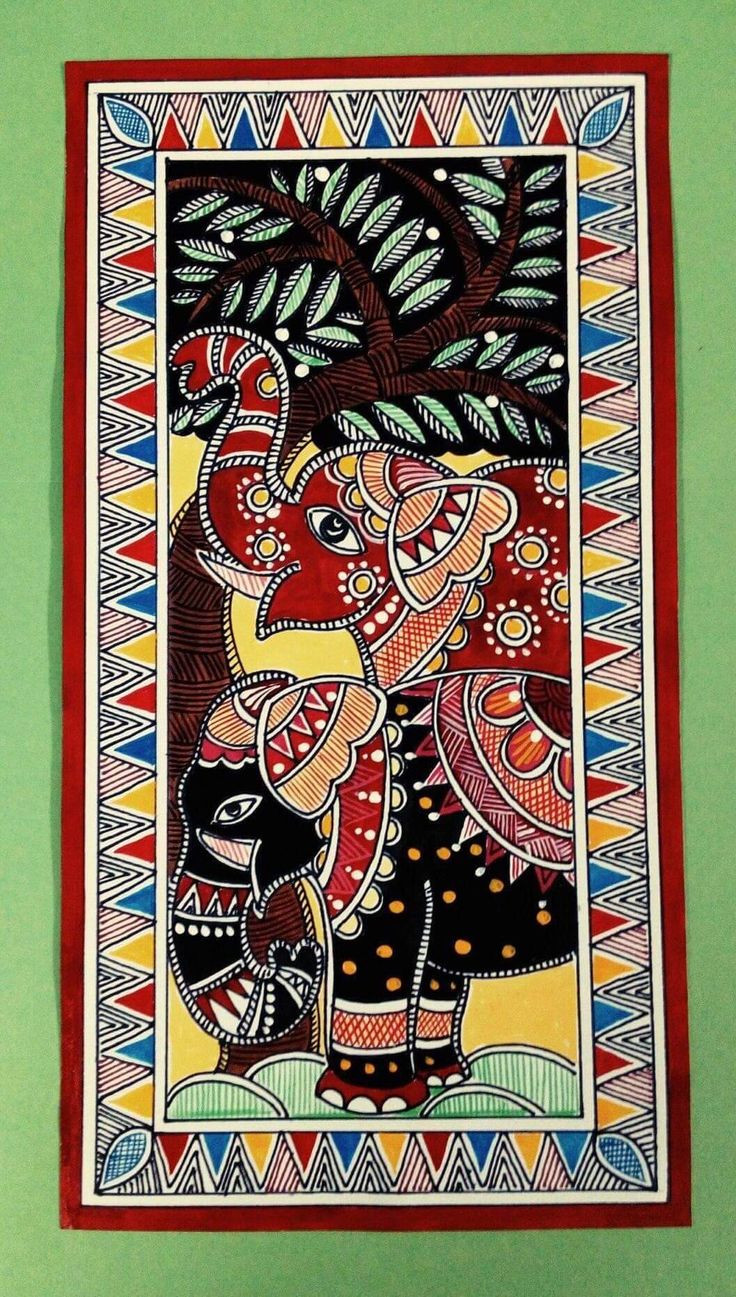 an elephant is depicted on a colorfully decorated wall hanging above a green painted wall