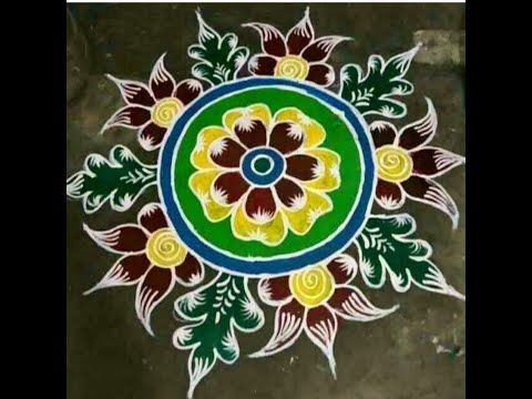 a colorful flower design painted on the ground