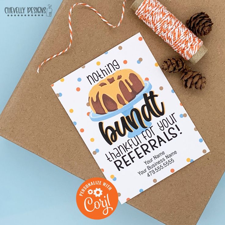 a greeting card with an image of a bundt cake and pine cones on it