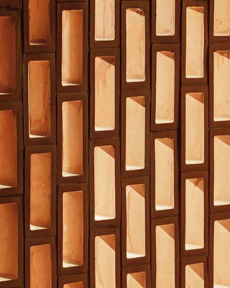 a close up view of a wall made out of small squares and rectangles