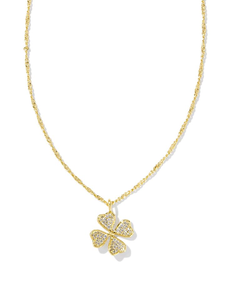 The good luck charm you didn’t know you needed—until now. The Clover Gold Crystal Short Pendant Necklace in White Crystal is an elevated take on a classic symbol of luck, featuring dainty crystal details for a super sparkly finish. Metal 14k Yellow Gold Over Brass Material White Crystal Closure Spring Ring Clasp Size 19" Chain, 0.61"L X 0.77"W PendantDue to the one-of-a-kind nature of the medium, exact colors and patterns may vary slightly from the image shown. | Kendra Scott Clover Gold Crystal Short Pendant Necklace in White Crystal | 14K Yellow Gold Aunties Love, Short Pendant Necklace, Symbol Of Luck, Birkenstock Boston Shearling, Boston Shearling, Kendra Scott Necklace, Gold Shorts, Pendant Necklace Gold, Clover Necklace