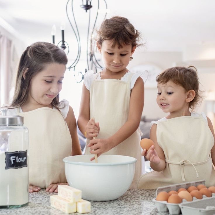 These kids aprons make a perfect gift! All apron designs are customizable. Choose from a design option you see available in our shop or send us your very own ideas. . . logos or sayings. We love custom orders! These are professionally printed with water based ink and machine washable. One size fits all. Need your order in a hurry? Add a Rush to your order. For $10 additional receive 24 hour processing and Priority Shipping. Here's the link: https://etsy.me/2I2vPVF • • • • • • • • • • • • • • • • Holiday Baking Gifts, Kid Apron, Personalized Kids Apron, Child Apron, Craft Apron, Full Apron, Floral Apron, White Wreath, Baking Apron