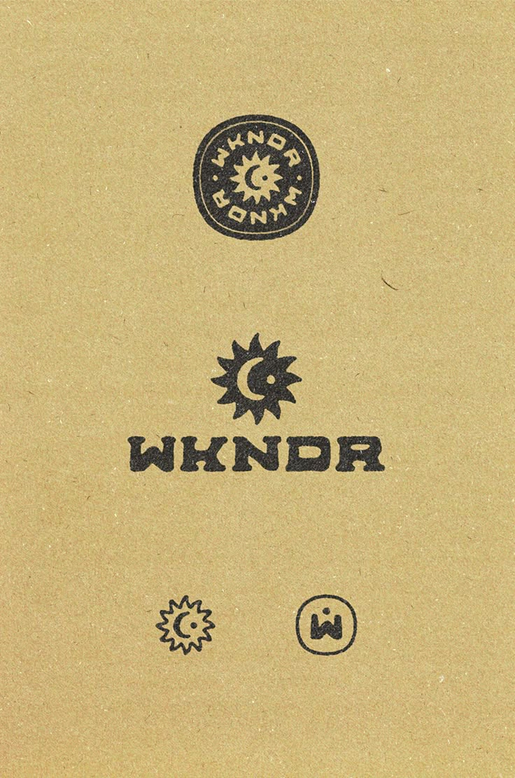 the back side of a brown box with black and white logos on it