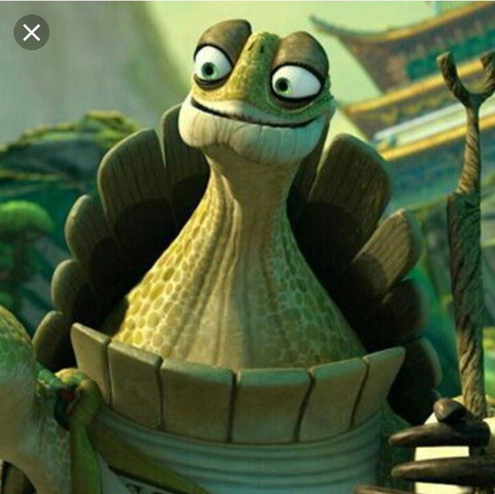 a cartoon character with big eyes sitting in a bucket