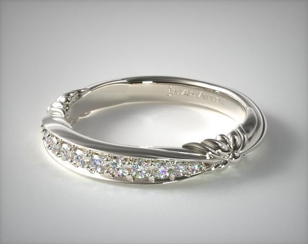 a white gold wedding band with diamonds