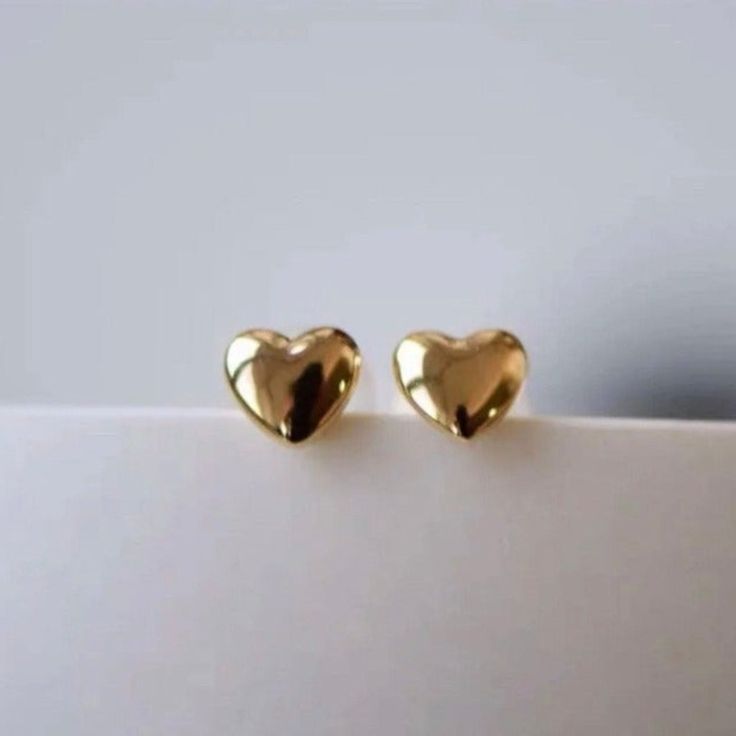 - Brilliant Tiny Gold Heart Stud Earrings W/ Long Post. - Material: Solid Au750 18k Gold; Au750 Stamps. - Color: Yellow Gold; - Size: Diameter Of Heart Is 0.16"(4mm); 11mm Post; - Package: A Pair Studs And 18k Gold Backs; Comes With A Jewelry Pouch. Reasonable Offers Are Welcome! Bundle More Items And Save More! Classic Gold Heart Earrings For Anniversary, Classic Gold Earrings For Valentine's Day, Gold Heart Earrings In Minimalist Style, Gold Round Heart Earrings For Mother's Day, Jewellery Dainty, Gold Heart Stud Earrings, Gold Heart Studs, Gold Heart Earring, Mini Earrings