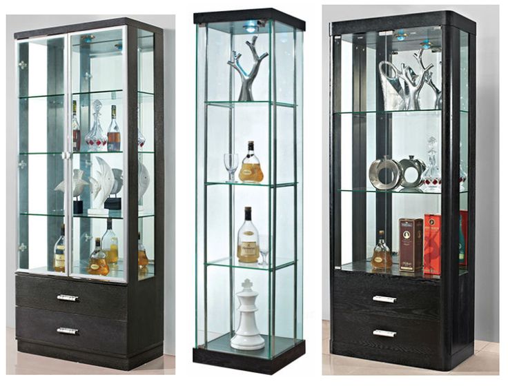 three different types of glass display cases in various sizes and colors, each containing liquor bottles