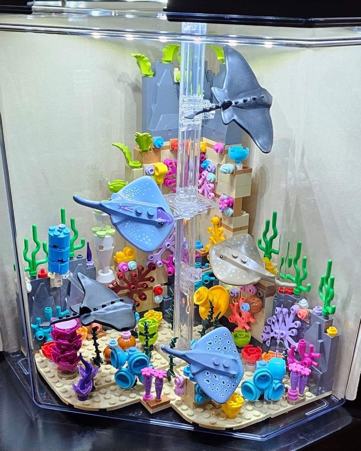 an aquarium filled with lots of different types of toys