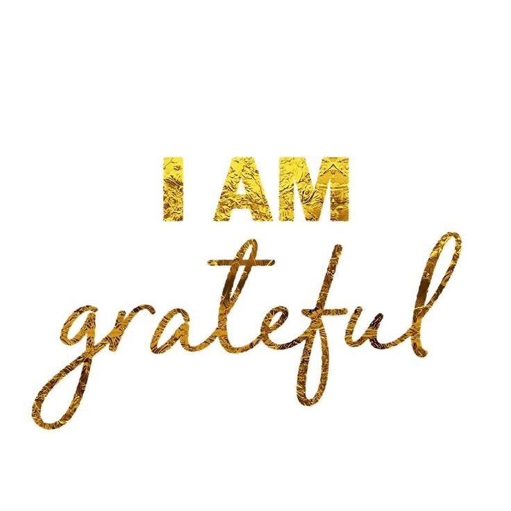 the words i am grateful written in gold glitter