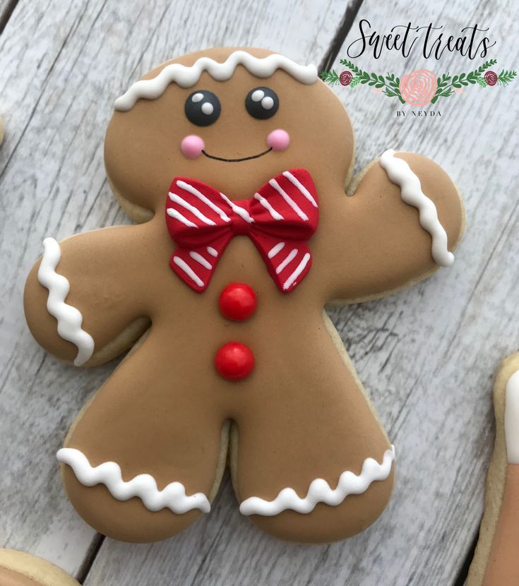 a close up of a decorated cookie on a table