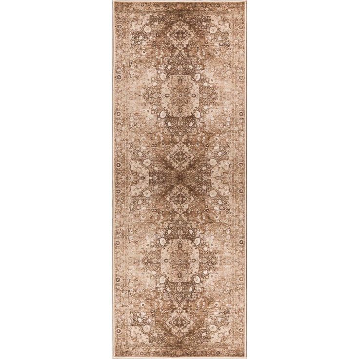 a beige and brown rug with an intricate design on the bottom, in front of a white background