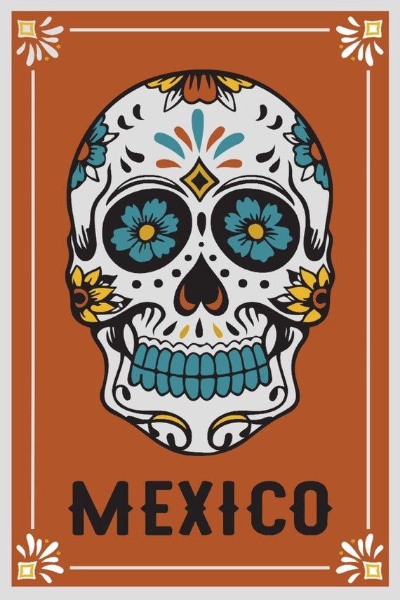 a mexican skull with flowers on it's head and the word mexico written in black