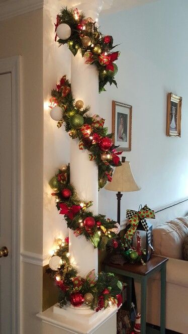 a christmas garland is hanging on the wall