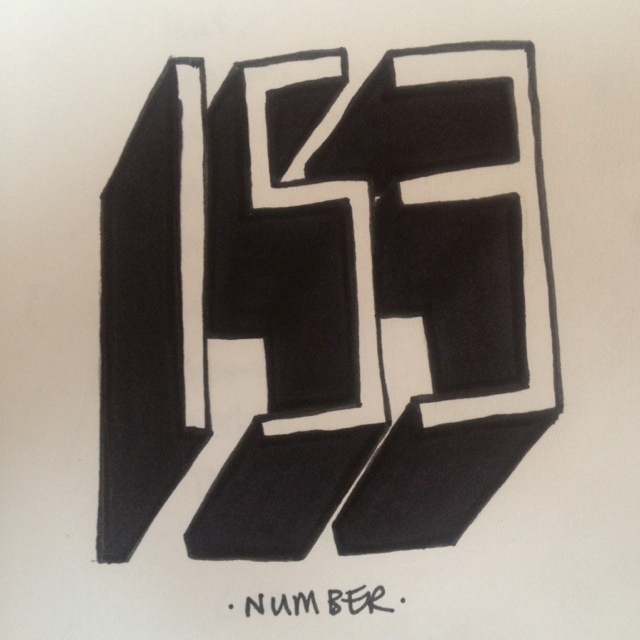 the logo for num be is drawn in black and white ink on a piece of paper