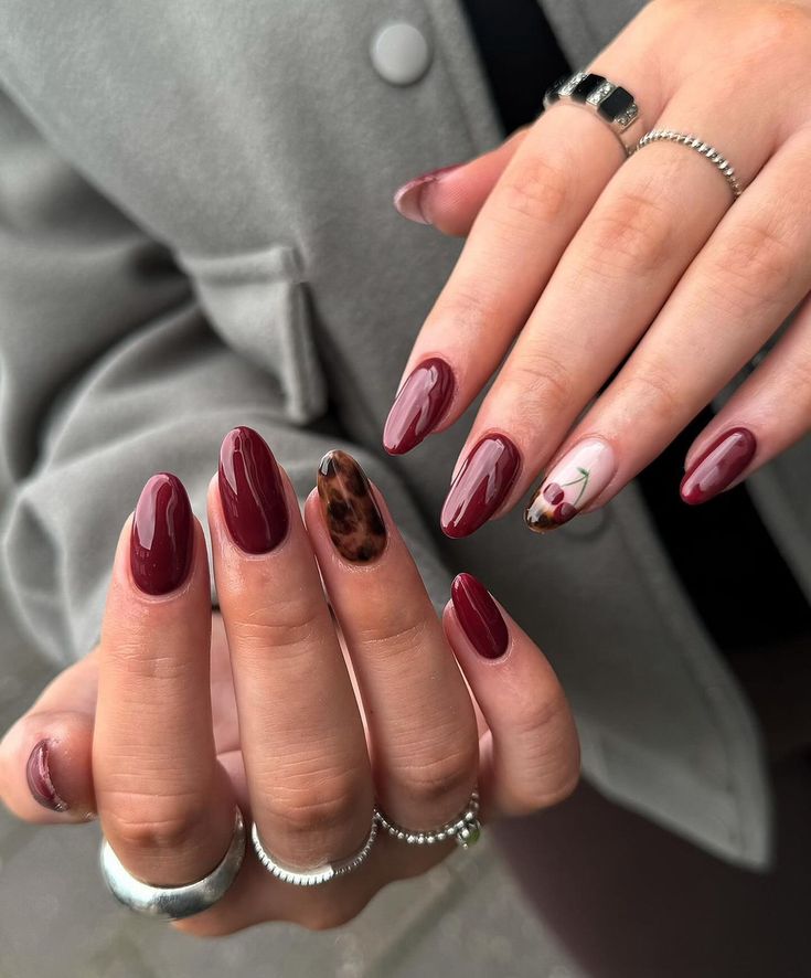 Ombre Cherry Nails, Tortoise Shell Accent Nail, Dark Red Tortoise Shell Nails, Wine Red Nail Inspo Almond, Tortoise And Red Nails, Red And Cheetah Print Nails, Red And Tortoise Shell Nails, Red Animal Print Nails, Red Cheetah Print Nails