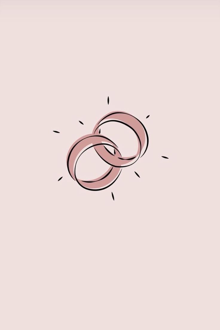 two wedding rings on top of each other in front of a light pink background with the word