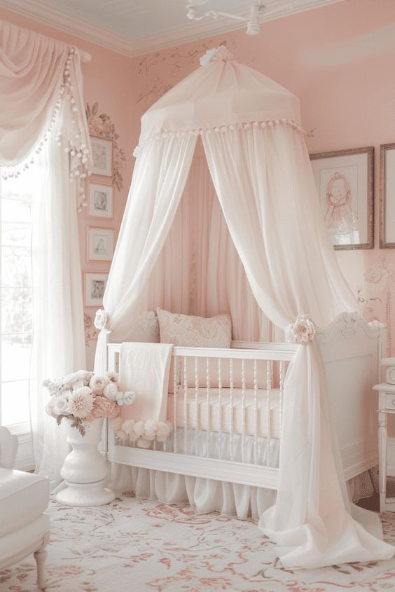 a baby's room decorated in pink and white with a canopy over the crib