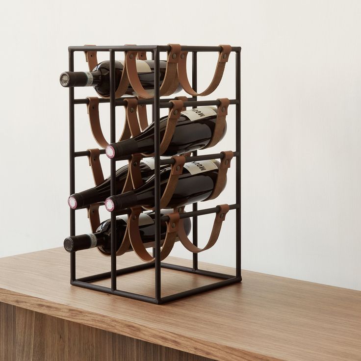 a wine rack with several bottles of wine in it