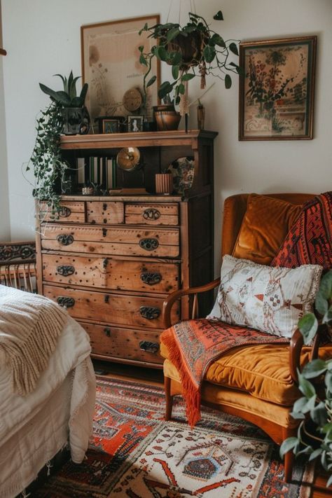 a bedroom with an old dresser, chair and bed