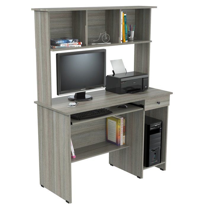 a computer desk with a monitor and printer on it's stand up shelf, in front of a white background