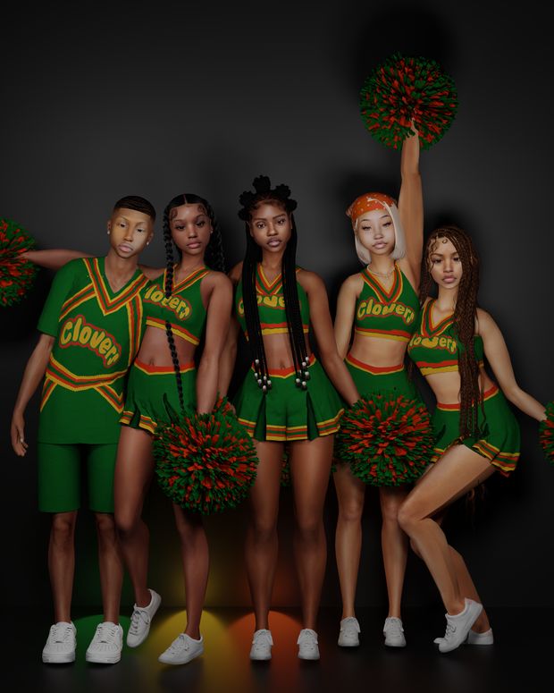 a group of cheerleaders pose for a photo in front of a black background