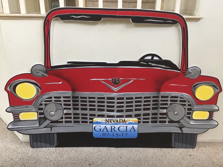 a red car with the license plate nevada garcia