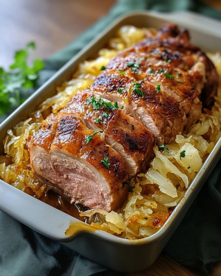 Delicious Oven Roasted Pork Loin with Sauerkraut Recipe Pork Loin Roast Oven Recipes, Slow Roast Pork Loin Oven, Oven Baked Pork Loin Roast, Aip Pork Loin Recipes, Pork Tenderloin Recipes With Sauerkraut, Pork With Sauerkraut, Rolled Pork Loin Roast Recipes, Roasted Pork And Sauerkraut, Pork Roast And Sour Kraut Recipes