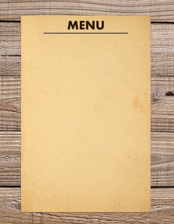 a piece of paper with the word menu on it sitting on top of a wooden table