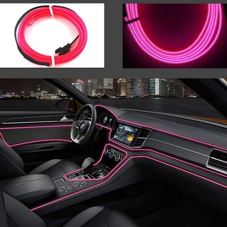 the interior of a car with pink neon lights and steering wheel cover in front of it