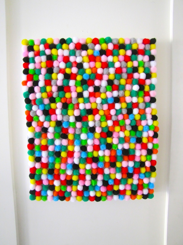 an art piece made out of colored balls