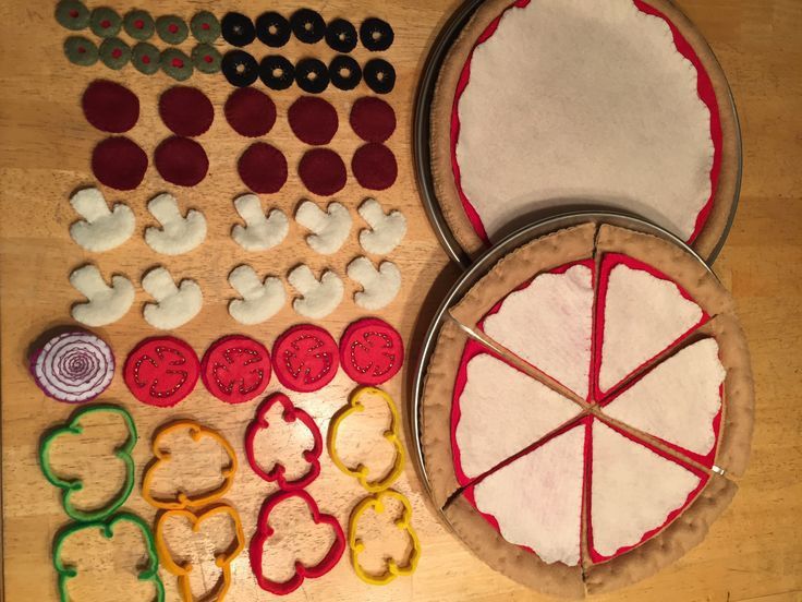 the supplies needed to make mickey mouse cookies are laid out on a wooden table top