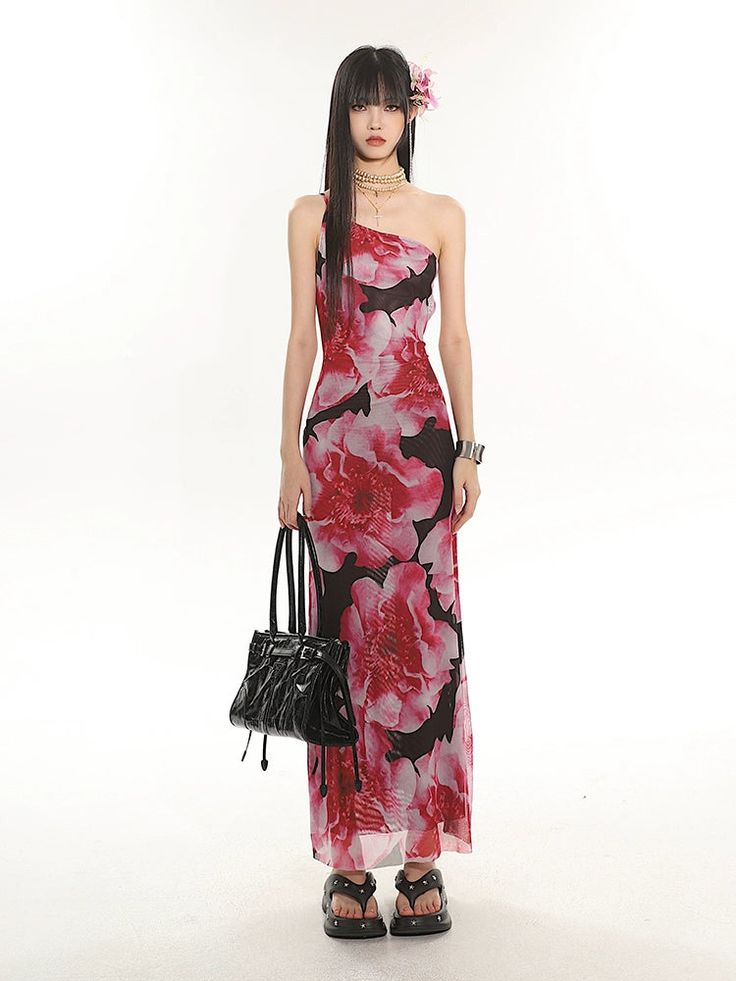 Embrace summer with a touch of elegance in our One Shoulder Floral Maxi Dress with a Back Cut-Out Detail.
Made with lightweight materials, this dress features a vibrant floral pattern that exudes a carefree vacation vibe. Its one-shoulder design coupled with a captivating back cut-out offers a blend of sophistication and charm, perfect for varied stylish outings.
This versatile piece transitions seamlessly from day to night, making it suitable for beach weddings, brunches, or evening events. Acc Style Analysis, Tropical Outfit, Brunch Dress, Indian Dresses Traditional, Graphic Dress, Flower Print Dress, Night Out Outfit, Beach Weddings, Glam Dresses