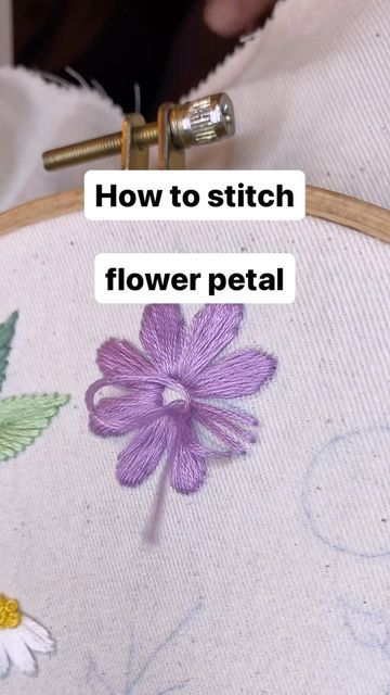 a close up of a piece of cloth with flowers on it and the words, how to stitch flower petal