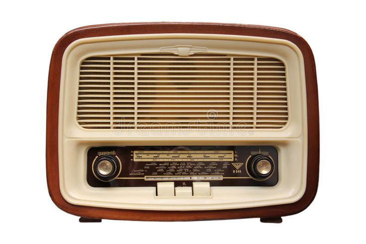 an old fashioned radio sitting on top of a table