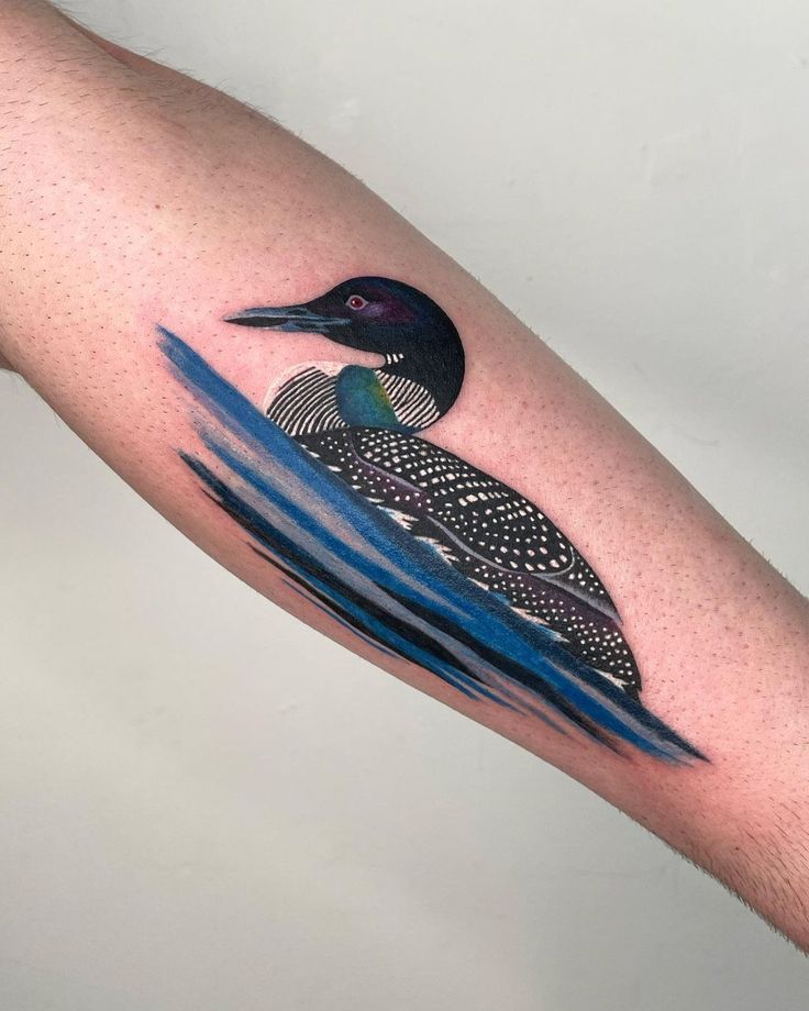 a bird sitting on top of a blue wave with black and white lines around it