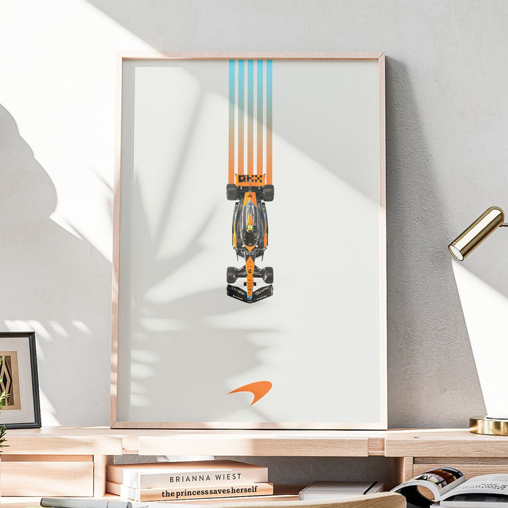 an art print of a ski lift hanging on a wall next to a book shelf