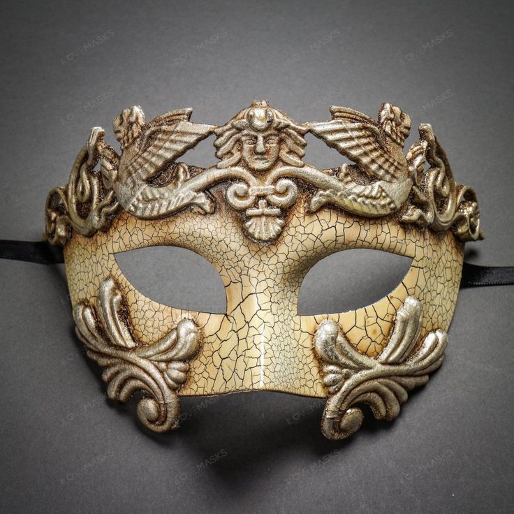 This Greek-Roman Emperor Mask Is Made From Paper Molding And Has An Aged Finish. Decorated With Cracked Texture On The Mask. The Mask Is About 6" Tall And 7" Wide. The Masquerade Mask Will Make A Great Costume Accessory. Made From Plastic With Paper Molding And Hand-Painted. Great For A Masquerade Ball Or Venetian Costume Features Mythological Beasts The Mask Is Approximately 6" Tall And 7" Wide Hand-Painted With An Aged And Cracked Finish Color: Crack White Silver Usm-M2599-Wtsv Masquerade Event, Gold Masquerade Mask, Masquerade Prom, Masquerade Ball Party, Mens Masquerade Mask, Venetian Masquerade Masks, Venetian Carnival Masks, Venetian Masquerade, Gold Mask