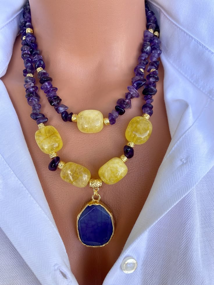 Raw Amethyst and Citrine Layered Necklace Set with Agate Pendant This elegant necklace set is a great gift for yourself and your loved ones. Made from natural crystal beads. All metal ornaments are gold plated and won't get darker in time! FREE SHIPPING - All orders get shipped within 1-2 business days. - 5-10 days of delivery time Returns are allowed 14 days after the delivery, however, the cost of delivery lies on the buyer. For more bracelets and necklaces!: https://finecrystalsdesign.etsy.co Yellow Gemstone Beaded Necklaces As Gift, Yellow Gemstone Beaded Necklace For Gifts, Yellow Amethyst Jewelry Gift, Yellow Double Strand Jewelry As Gift, Yellow Double Strand Jewelry For Gift, Amethyst And Citrine, Unique Statement Necklace, Ocean Inspired Jewelry, Metal Ornaments