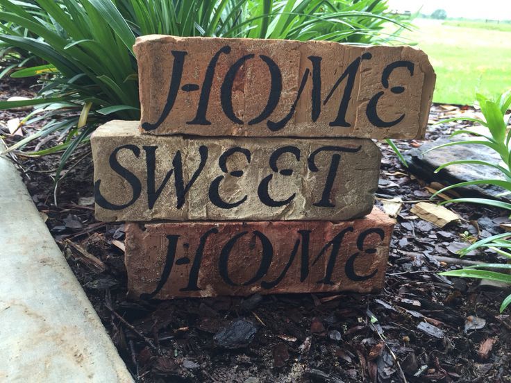 a brick sign that says, home sweet u - ove and the words'i love you'written on it