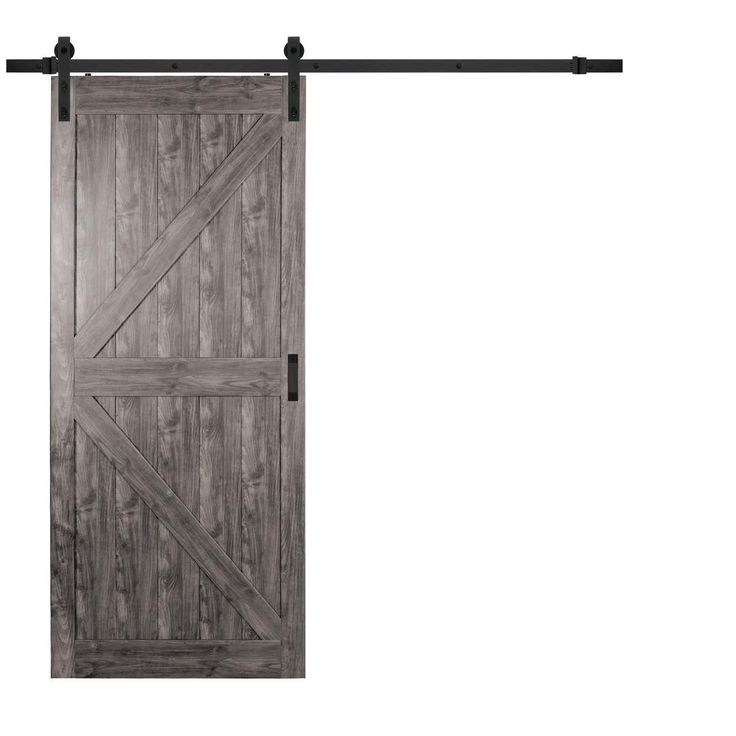 the sliding barn door is made from wood and has black metal bars on each side