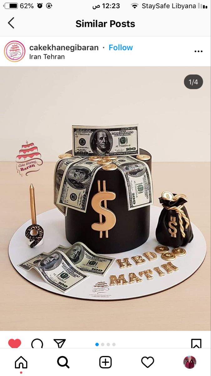 a cake that has money on top of it