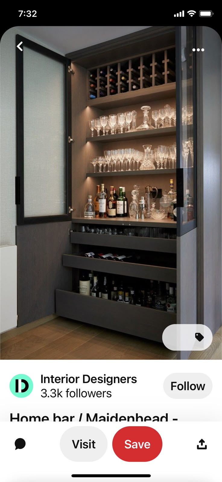 an image of a bar with wine glasses on the top shelf and shelves below it