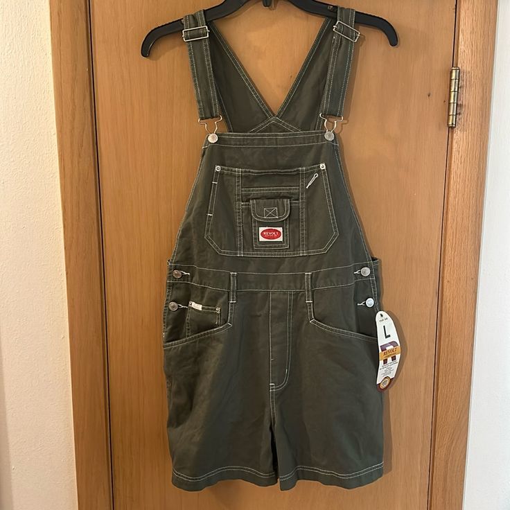 Revolt Clothing Co Women’s Shortalls Overalls In Army Green. Brand New With Tags. Y2k, 90s. Measures 32 Inches In Total Length And 4 Inch Inseam. Size Women’s Large. Casual Bib Front Overalls For Streetwear, Revolt Overalls, Green Dungarees, Character Chart, Green Overalls, Male Clothes, Overalls Outfit, Gardening Outfit, Jean Overalls