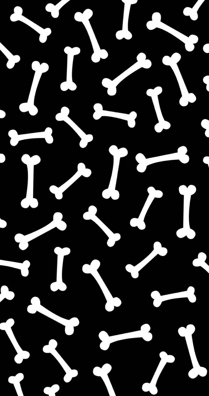 a black background with white bones and crossbones