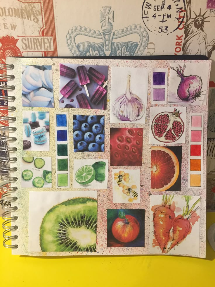 an open notebook with various pictures and fruit on it's cover, sitting on top of a yellow table