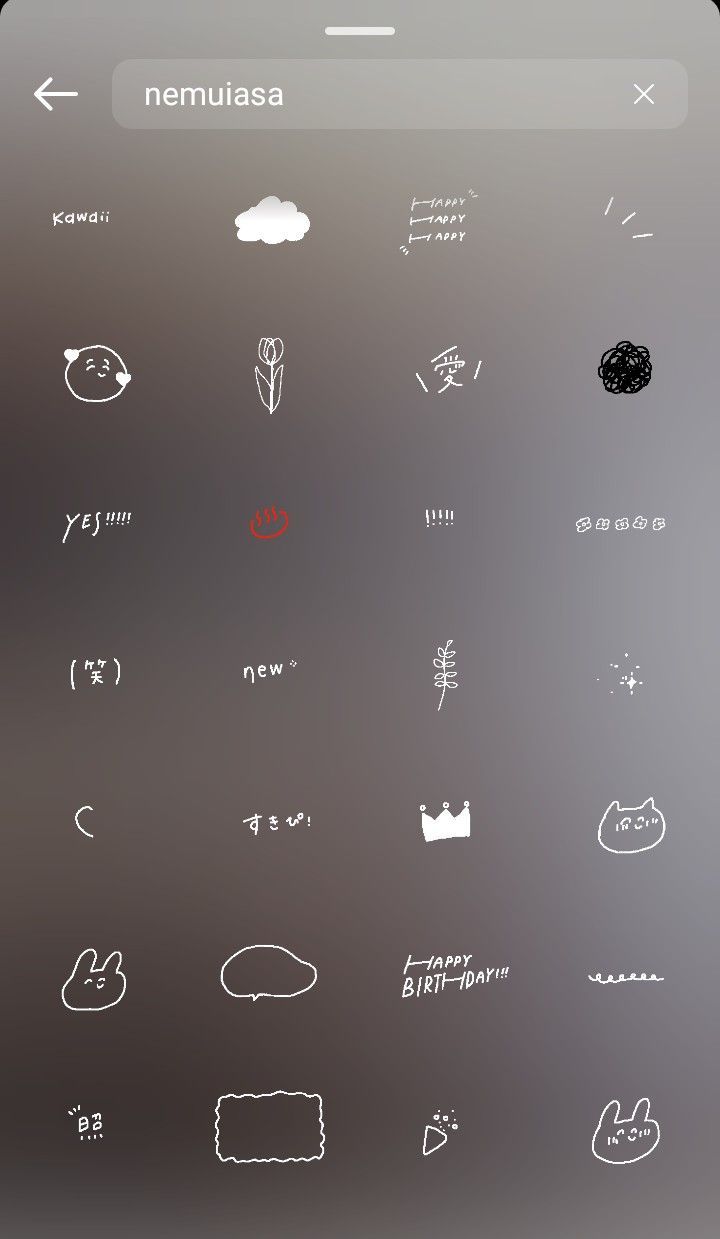 an iphone screen with various hand drawn symbols on the back and bottom half of it