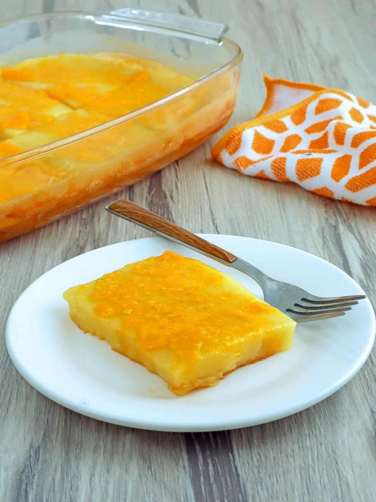 a piece of cheese cake on a plate with a fork