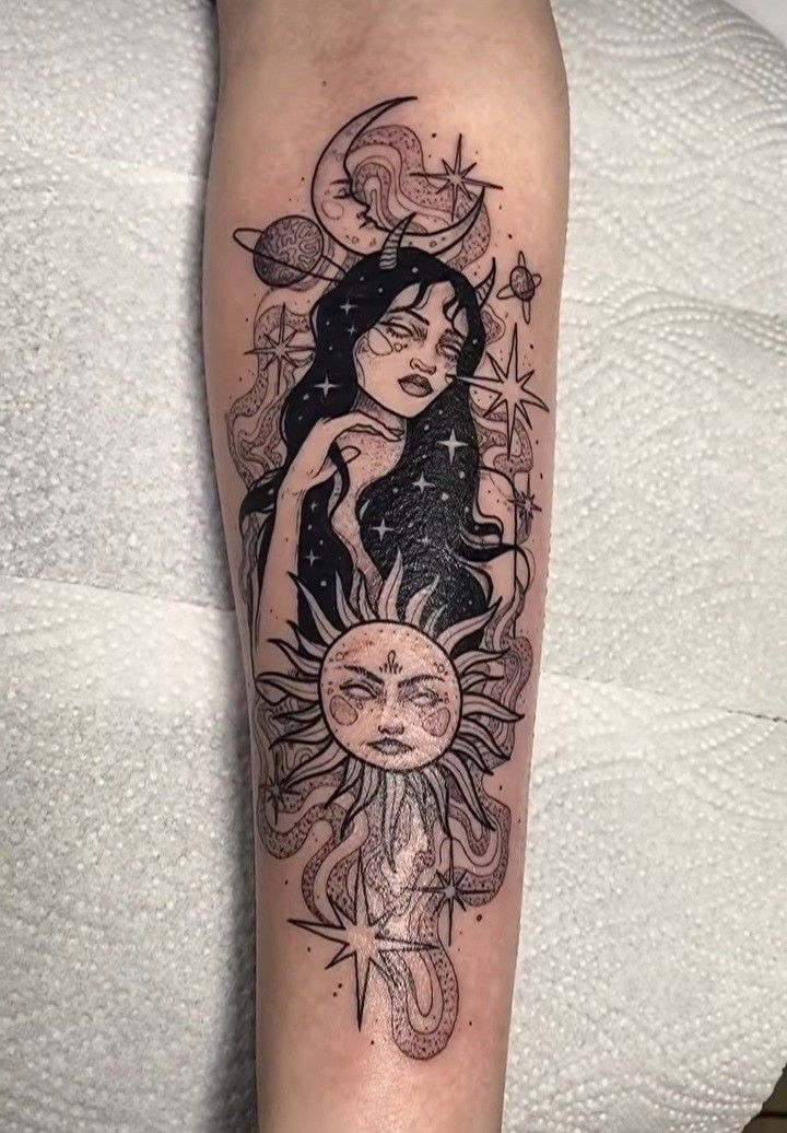 a tattoo on the leg of a woman with sunflowers and stars in her hair