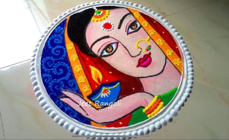 a decorated cake with an image of a woman holding a blue and yellow flower in her hand