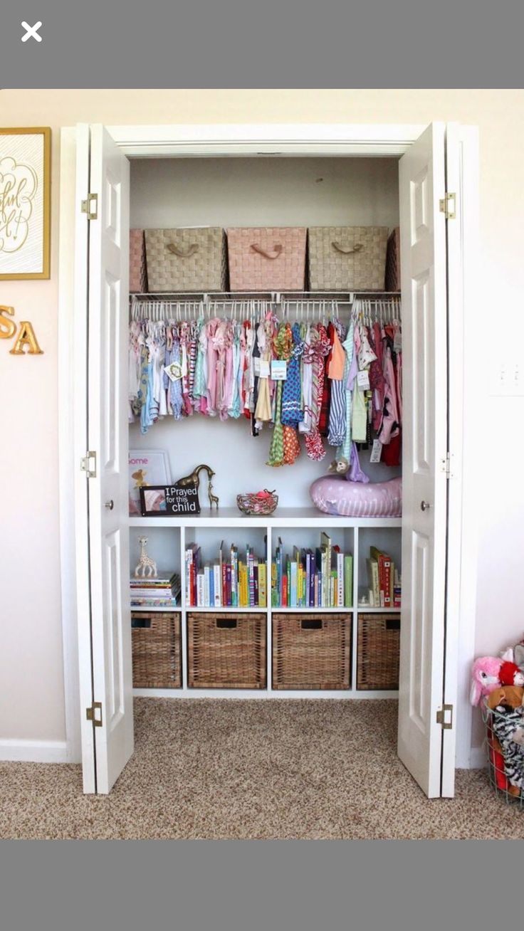 the closet is full of clothes and toys